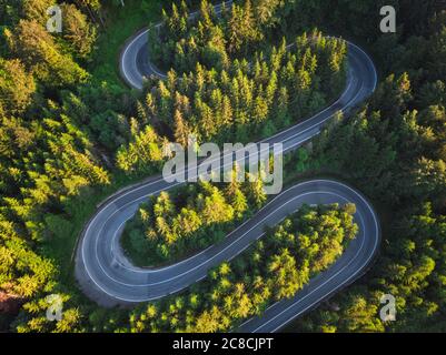 Aerial landscape of mountain winding road, in Transylvania Stock Photo