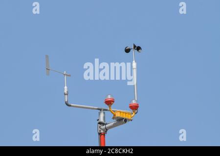 Anemometer on weather station measuring wind speed for climate change trends and forecasting Stock Photo