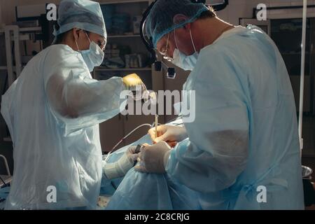 Surgeon uses surgical mallet during the maxillofacial surgery close up Stock Photo