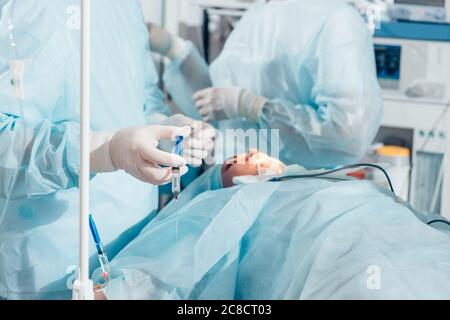 Plastic surgery of the nose in operating room, rhinoplasty Stock Photo
