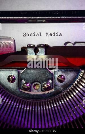 Vintage typewriter with the word Social Media printed on a sheet of paper social networking concept Stock Photo