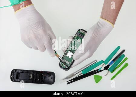 Professional repair of the  codless dect  phones in the european service  center. Stock Photo