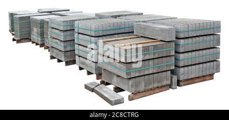 Stacks of new concrete paving slabs on wooden palettes . Isolated on white panoramic colage Stock Photo