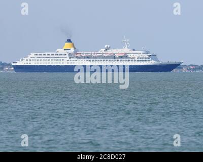 Sheerness, Kent, UK. 23nd July, 2020. The distinctictive blue Saga Sapphire cruise ship was seen departing the Thames this afternoon after being laid up for months in Tilbury. The ship has been sold to Anex Tours and the name changed to Blue Sapphire for the 2021 season. Credit: James Bell/Alamy Live News Stock Photo