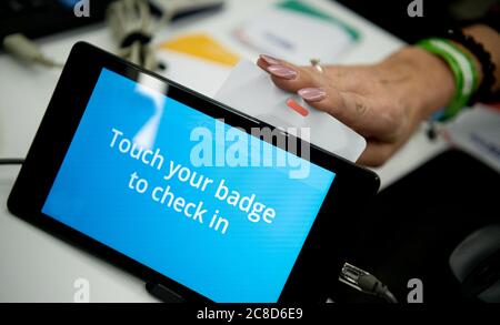 Scanning Using Smart Phone or Tablet at an Event Stock Photo
