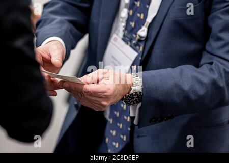 Exchanging Business Cards at a Meeting Event Stock Photo
