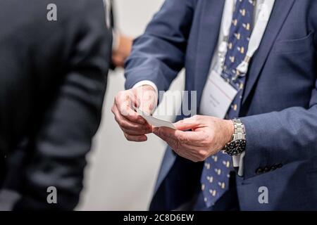 Exchanging Business Cards at a Meeting Event Stock Photo