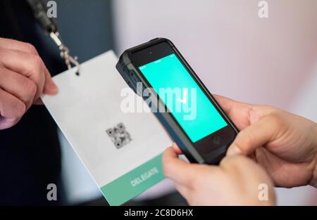 Scanning Using Smart Phone or Tablet at an Event Stock Photo