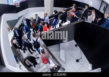 People walking on a Staircase at Business and Academic Conference Event Stock Photo