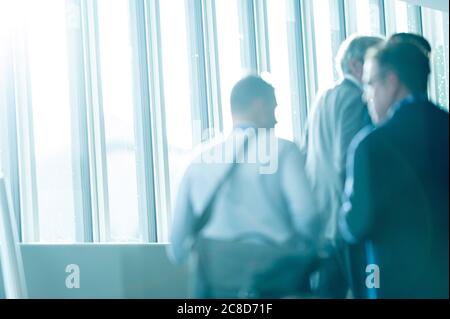 People walking on a Staircase at Business and Academic Conference Event Stock Photo