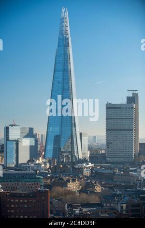 The Shard seen from the City, looking south east. Guy's Hospital is on right hand side of image. The Shard, London, United Kingdom. Architect: Renzo P Stock Photo