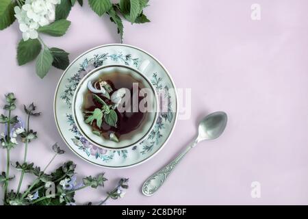 Herbal tea with sage and mint leaves. Stock Photo
