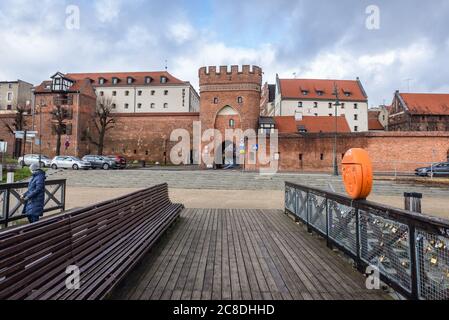 Bridge Gate one of the three medieval gates in Old Town of Torun, Kuyavian Pomeranian Voivodeship of Poland Stock Photo