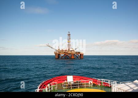 Drilling rig stationed on the open sea Stock Photo