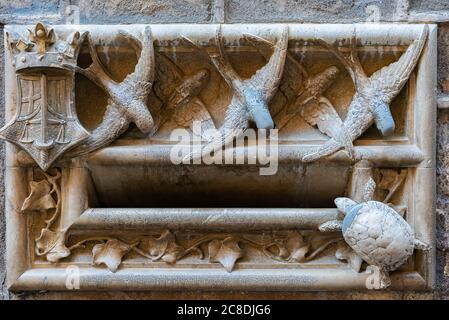 The mailbox of Casa de l'Ardiaca in Barcelona. Swallow and turtle as symbols of justice Stock Photo
