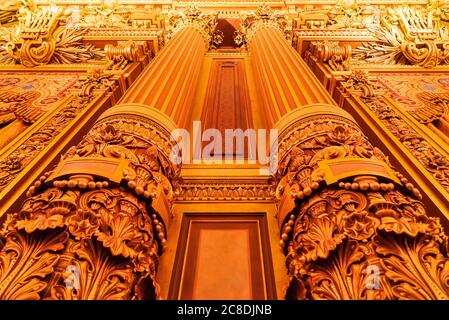 Paris, France - November 14, 2019: Wall and columns of the Opera National de Paris Garnier lobby of the main staircase. View from the floor Stock Photo
