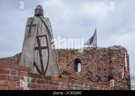 Knight statue in ruins of 13th century Teutonic Knights castle in Old Town of Torun, Kuyavian Pomeranian Voivodeship of Poland Stock Photo