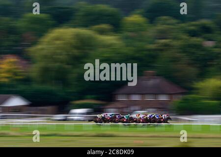 Runners and Riders in action during The Imber Court Handicap at Sandown Park Racecourse. Stock Photo