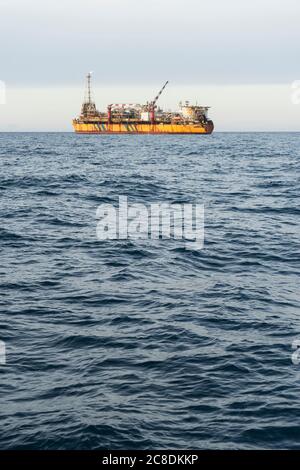 FPSO and supply ship Stock Photo