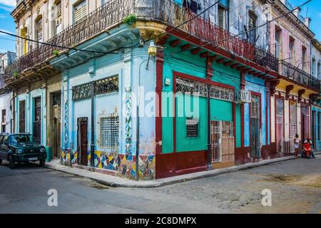 Havana, Cuba, July 2019, Colourful corner building in the oldest part of the city Stock Photo