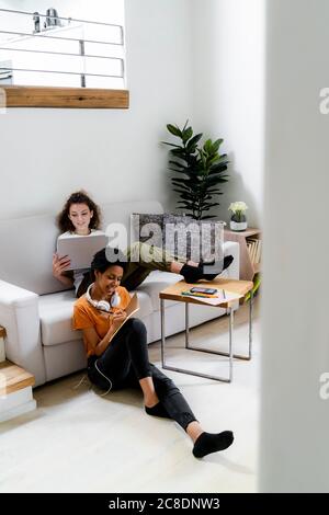 Two students working learning at home Stock Photo