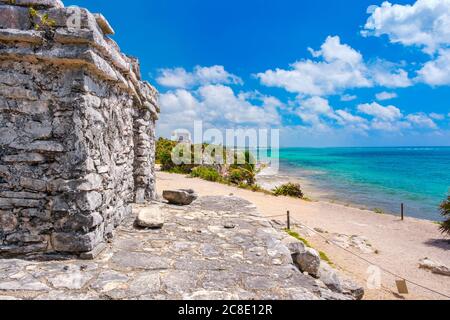 Mayan ruins next to the ocean at the ancient city of Tulum in Mexico Stock Photo