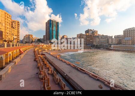 Egypt, Alexandria, Cityscape with Stanley beach at sunset Stock Photo