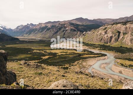 Scenic view of landscape and mountains against sky during sunny day, Patagonia, Argentina Stock Photo