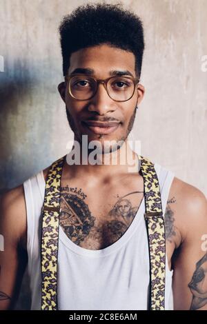 Portrait of a stylish tattooed young man Stock Photo