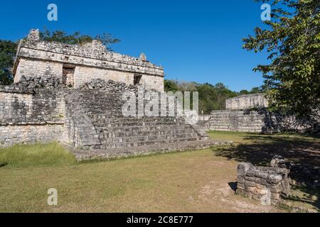 The stairway to one of the partially restored ruins of the twin temples on top of Structure 17 in the ruins of the pre-Hispanic Mayan city of Ek Balam Stock Photo