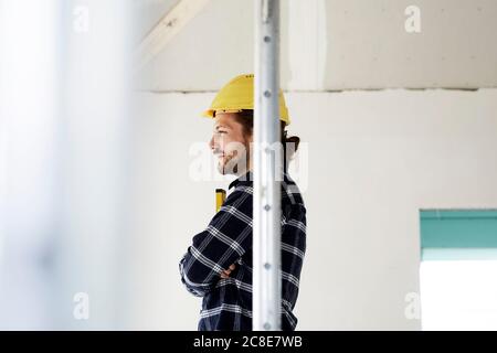 Pensive worker on a construction site Stock Photo