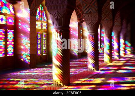 Iran, Fars Province, Shiraz, Sunlight illuminating interior of Nasir-ol-Molk Mosque through colorful stained glass windows Stock Photo