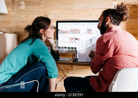 Young architects couple working at home Stock Photo