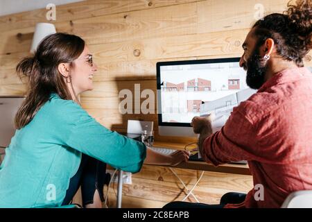 Young architects couple working at home Stock Photo