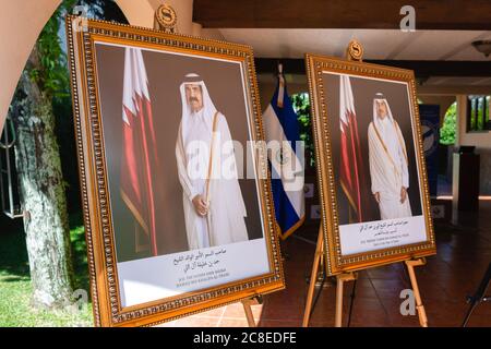 San Salvador, El Salvador. 23rd July, 2020. Pictures of Mr. Hamad Bin Kalifa Al-Thani and his son the Emir of the State of Qatar, Sheikh Tamim Bin Hamad Al-Thani. The State of Qatar made a donation of medical supplies and protection to the Association of Journalists of El Salvador (APES) in the context of the health crisis caused by the COVID-19 pandemic. Credit: Carlos Diaz/Alamy Live News. Stock Photo