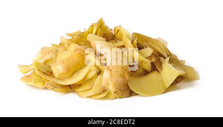 Heap of fresh yellow potato peels isolated on white background. Cook boiled potatoes at home. Household biodegradable waste. Front view. Stock Photo