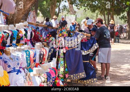 Handicraft market selling traditional mexican dresses at Chichen Itza Stock Photo
