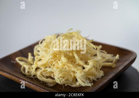 Japanese dried squid snack Stock Photo - Alamy
