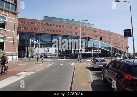Town hall, municipal office or Stadskantoor in the center of Alkmaar. A modern building with an underpass for traffic. Netherlands, April Stock Photo