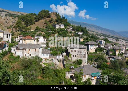 Gjirokastra or Gjirokaster, Albania.  Typical traditional property on edge of old town. Gjirokastra is a UNESCO World Heritage Site. Stock Photo