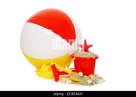 beach toys with sand and seashells isolated on white Stock Photo