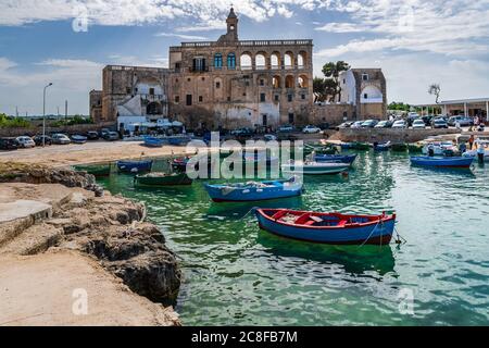 Monastery and boats frame the bay of San Vito. Stock Photo