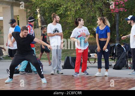 Varna, Bulgaria - July, 19, 2020: young people dancing break dance on the street of Varna Stock Photo