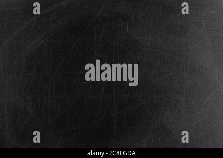 rubbed out chalk on black chalkboard, full frame Stock Photo