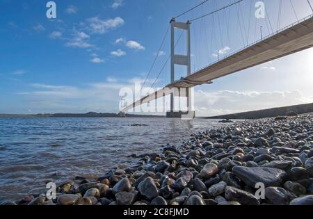 The original Severn Bridge that spans the River Severn and River Wye between Aust  in England, and Chepstow in Wales. Stock Photo