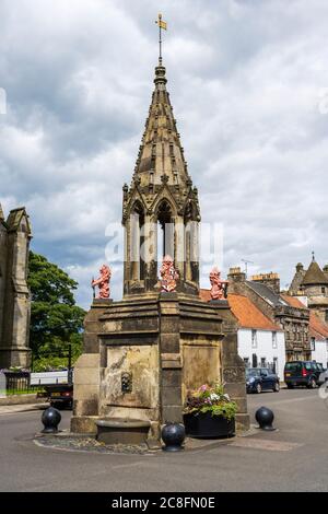 The Bruce Fountain in the centre of the High Street in the village of Falkland in Fife, Scotland, UK Stock Photo