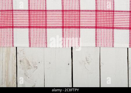 kitchen napkin over old white wooden planks Stock Photo