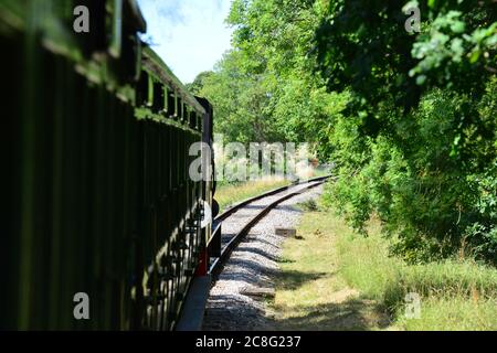 Royal Engineer reversing backwards on the Isle of Wight steam railway. Stock Photo