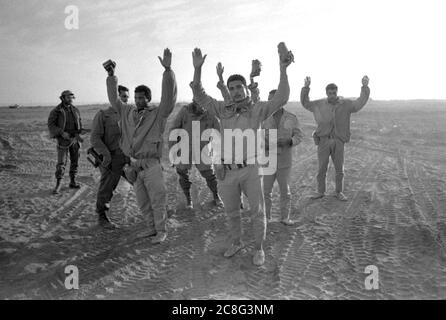 Israel. 06th July, 2020. Egyptian soldiers stand with their hands up in the sand, surrendered during the Yom Kippur War, the Yom Kippur War between Israel and the Arab States Egypt, Jordan and Syria lasted from October 6th to October 25th, 1973 | usage worldwide Credit: dpa/Alamy Live News Stock Photo