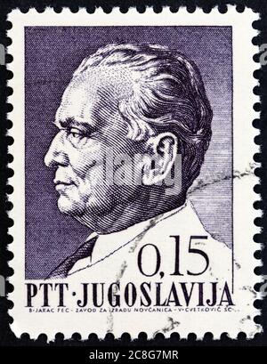 YUGOSLAVIA - CIRCA 1967: A stamp printed in Yugoslavia issued for Tito's 75th birthday shows President Tito, circa 1967. Stock Photo